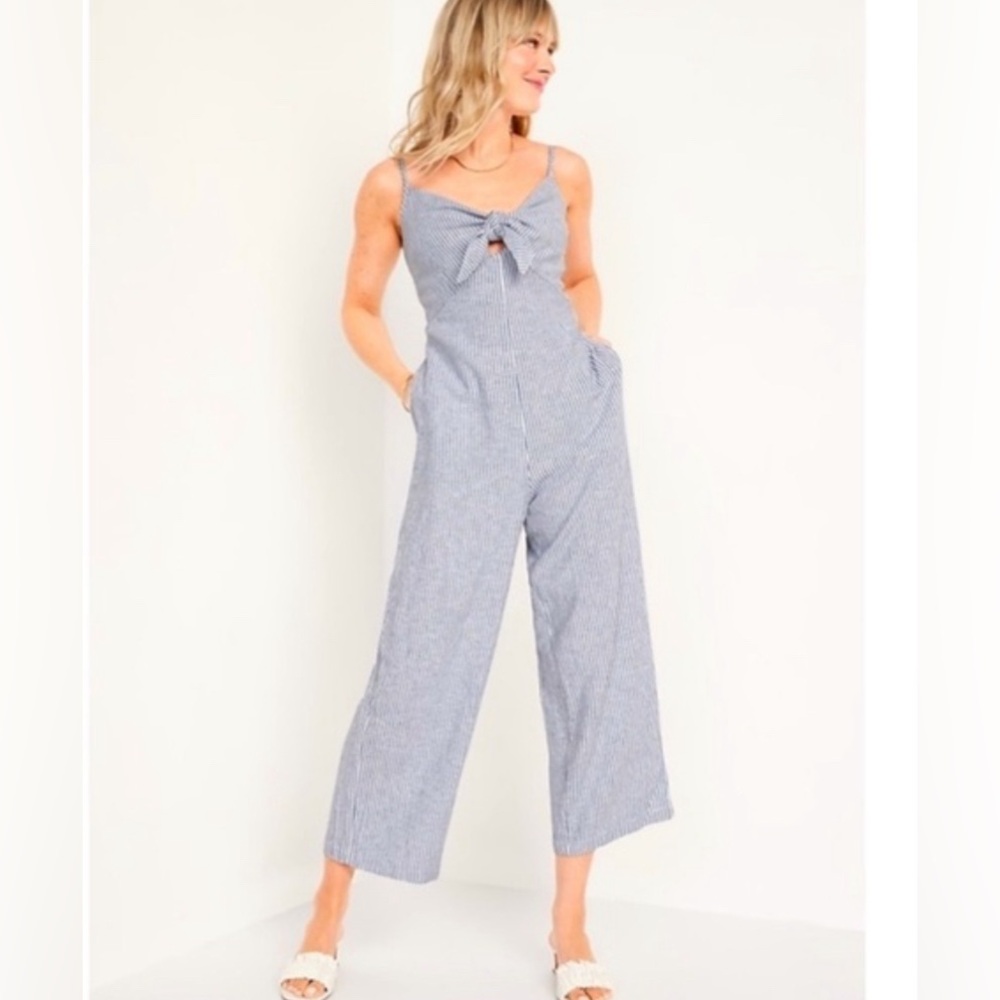 old navy medium never worn jumpsuit with tie in front. spaghetti straps